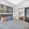 Secondary bedroom with sliding barn door entry to bathroom